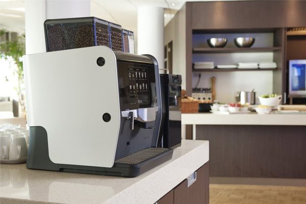 Coffee maker on bar
