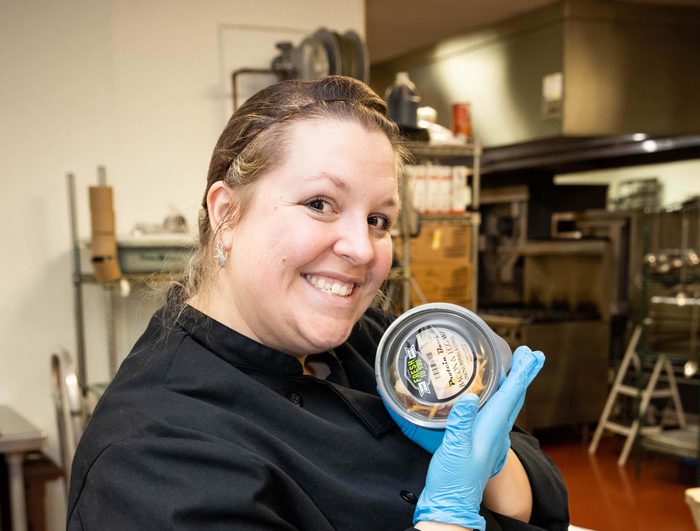 Portait of lady holding packaged food