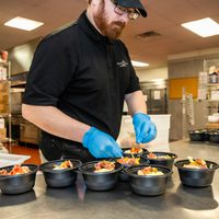 Employee making meals