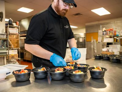 Employee making meals