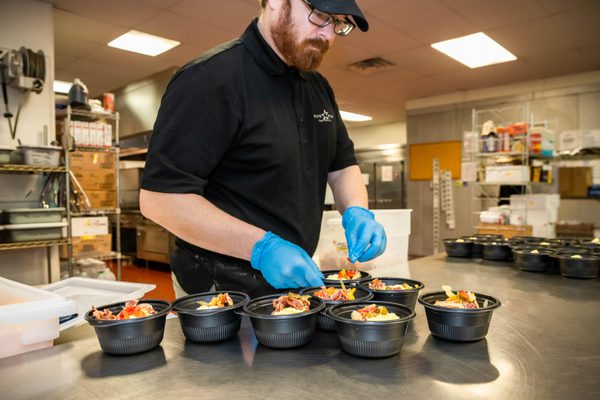 Employee making meals